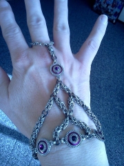 purple metal accent slave bracelt